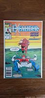 Front cover of Excalibur #3 in bag and board