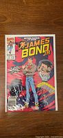 Front view of bagged James Bond Jr. #1 comic