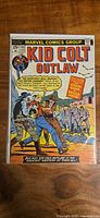 Front cover of Kid Colt Outlaw #191 in bag and board