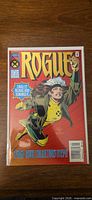 Front cover of Rogue #1 comic book in bag and board