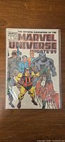 Front cover of Marvel Universe Update '89 #2 comic in bag and board