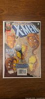 Full front cover of The Uncanny X-Men #332 in bag and board