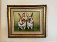 Framed rabbit artwork full frontal view
