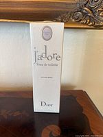 Front of sealed J'adore Eau de Toilette box showing branding and size