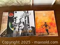 Four magazines laid out side by side