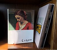 Front view showing Corot book and spines of Seven Centuries of Art and Modern American Painting