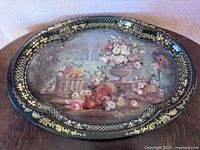 Full view of oval tray showing entire painted scene and gold border.