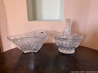 Both crystal pieces side by side on table