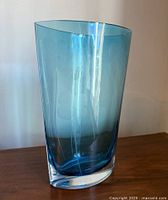 Front view of blue etched glass vase