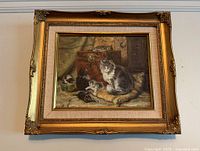 Front view of framed cat and kittens print