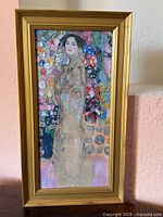 Full view of framed Klimt print in gold frame