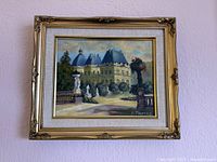 Front view of framed landscape painting showing full artwork and frame