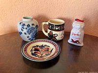 Full view of all four ceramic items on table