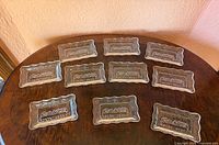 All ten rectangular clear glass dishes on table
