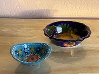 Both Mexican pottery bowls side by side on tabletop