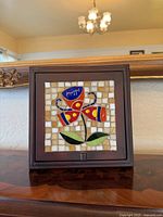 Front view of entire jewelry box on furniture surface