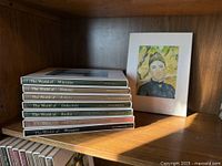 Stack of eight Time Life Library of Art hardcover books showing spines