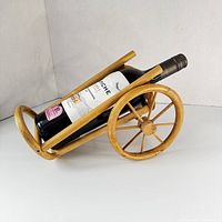 Side view with wine bottle for scale