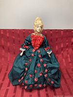 Front view of the doll in full gown