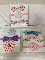 All three sealed packs of headbands displayed