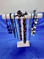 Front view of stand with all necklaces visible