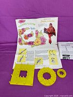 square and round yellow looms with instruction sheets on purple backdrop