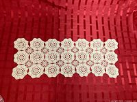 Full view of crochet runner placed horizontally