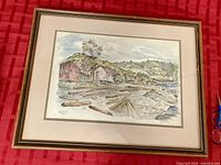 Framed Jean Davis watercolour print with mat and wood frame on red cloth