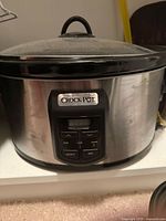 Front view showing full unit, lid, control panel