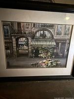 Full view of framed print showing image, mat and frame