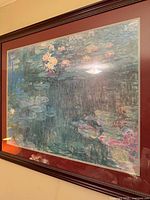 Full front view of framed Monet print showing image, mat and frame