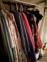 Rack with assorted women’s tops and jackets