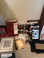 Group shot of frames, album and both holders