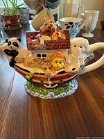 Front view of Noah’s Ark teapot with animals