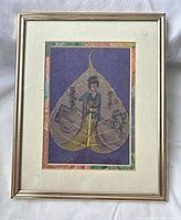 Front view of framed Chinese leaf painting