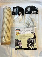 All items: roll-up mat, IKEA child safety items, Jolly Jumper weathershield