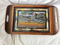 Top view of tray showing mosaic scene and handles