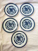 All five blue and white plates arranged
