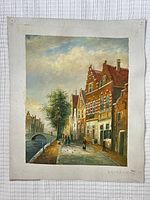 Front view of unstretched oil painting townscape on canvas