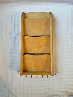 Full view of wooden wall organizer front