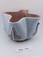 Top view showing star-shaped ruffle rim and pink interior