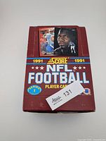 Closed box top with 1991 Score NFL Football branding