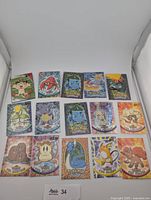 Front view of all 15 Topps Pokémon cards arranged in three rows