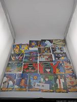 All 25 Topps Pokémon cards laid out in light box