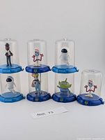 All seven Pixar Domez figures grouped together