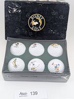 Front view of sealed Disney Golf box showing six character golf balls