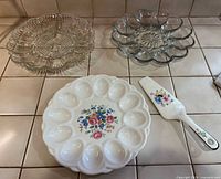 All three trays and spatula displayed on counter