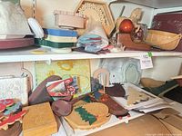 Shelf of assorted wood craft items, plaques, boxes, trays, horse figurine, coaster blanks