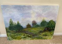 Front view of entire unframed landscape painting on canvas