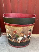 Front view showing full bucket and painted scene